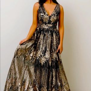 Baltic Born “Marcellus’ shimmer gown in black. Size large